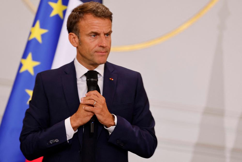 France’s President Emmanuel Macron addresses mayors of cities affected by the violent clashes that erupted after a teen was shot dead by police last week during a meeting at the presidential Elysee Palace in Paris on July 4, 2023. AFPPIX