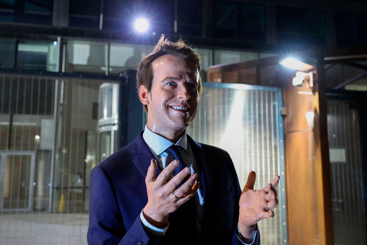 A photo shows a wax statue of French President Emmanuel Macron, stolen the day before from the Grevin Museum, during an action by Greenpeace environmental activists outside the EDF headquarters in Paris on June 3, 2025. (Photo by Xavier GALIANA / AFP)