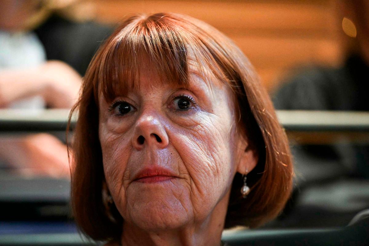 Gisele Pelicot looks on, inside the courtroom, before the appeal trial in the Mazan rape case at the Nimes courthouse, southern France, in Nimes on October 6, 2025. The trial will take place at the Court of Appeal in Nîmes from October 6 to October 9, 2025. (Photo by Gabriel BOUYS / AFP)
