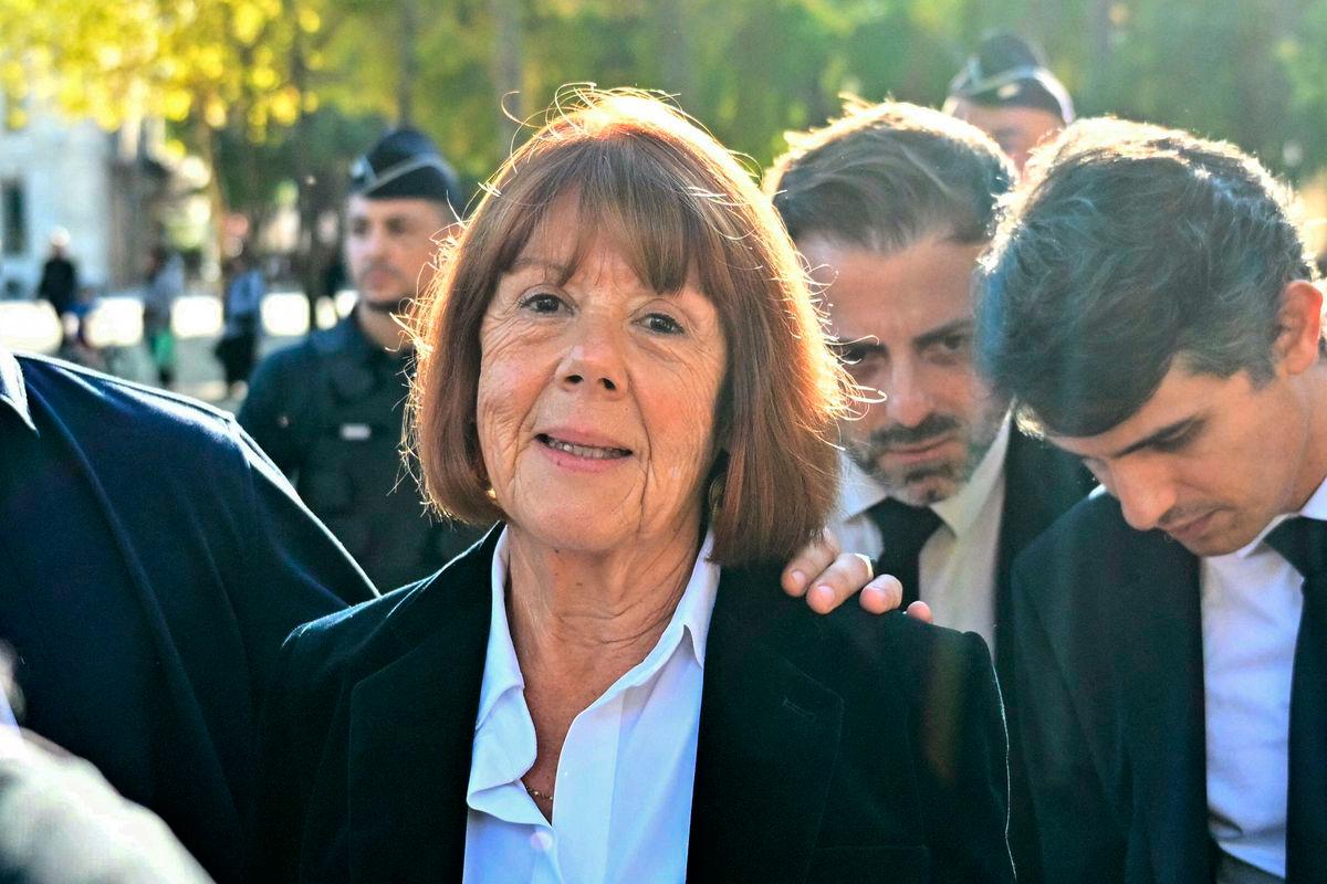 Gisele Pelicot looks on as she exits the courthouse during the appeal trial in the Mazan rape case at the Nimes courthouse in Nimes, southern France, on October 8, 2025. (Photo by Christophe Simon / AFP)