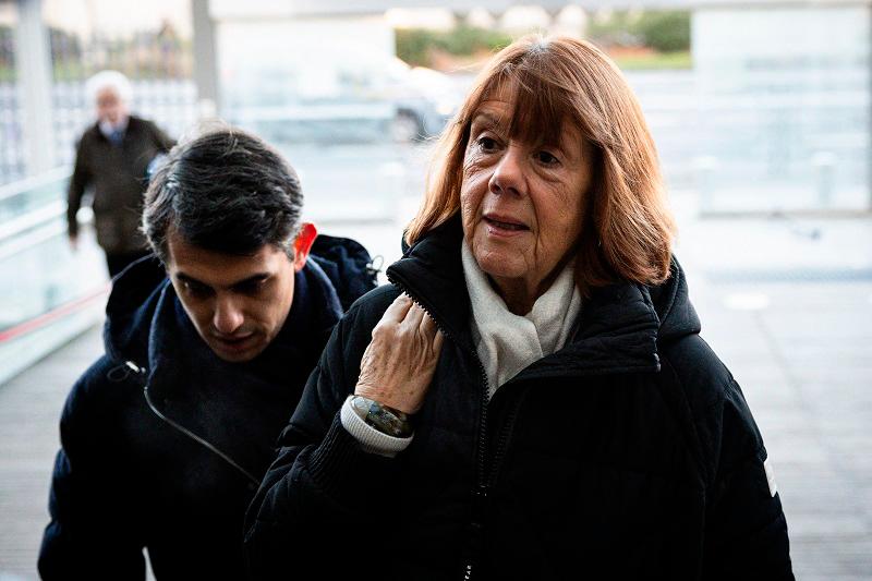 Gisele Pelicot and one of her lawyers Stephane Babonneau (L) arrive at the Avignon courthouse for the last day of the defense’s final pleas, at the trial of her former partner Dominique Pelicot accused of drugging her for nearly ten years and inviting strangers to rape her at their home in Mazan, a small town in the south of France, in Avignon, on December 16, 2024. In a trial that has shocked the country and whose verdict is expected this week, Dominique Pelicot, 72, has admitted to drugging his then wife Gisele Pelicot for almost a decade so he and strangers he recruited online could rape her. - CLEMENT MAHOUDEAU / AFP