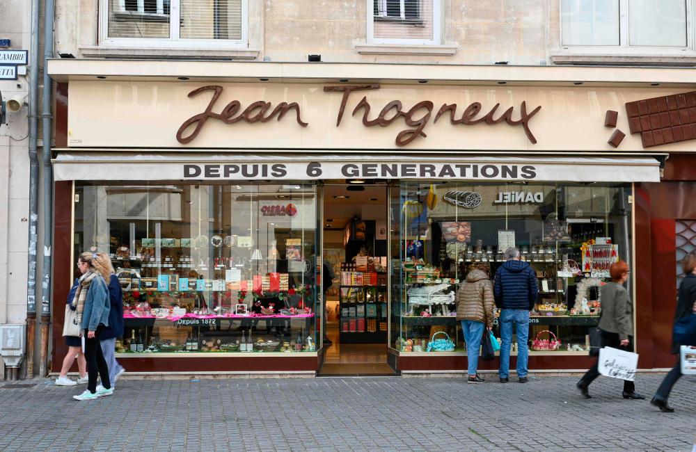 A picture shows a chocolate shop owned by French First Lady Brigitte Macron’s grandnephew Jean-Baptiste Trogneux who was attacked a day before by anti-government protesters, in Amiens on May 16, 2023/AFPpix
