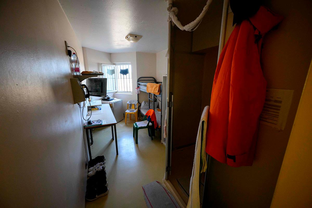 A cell for is pictured at the detention center in Seysses, south-western France, on August 7, 2025. At the overcrowded Seysses prison in Haute-Garonne, inmates are trying to cope with the heat on August 7, 2025, as Météo France has issued an orange heatwave alert for the next day. - Lionel BONAVENTURE / AFP