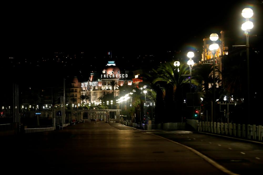 A general view shows the empty Promenade des Anglais during a new nightly curfew imposed in an effort to combat the second wave of the coronavirus disease (Covid-19), in Nice, France October 24, 2020. — Reuters