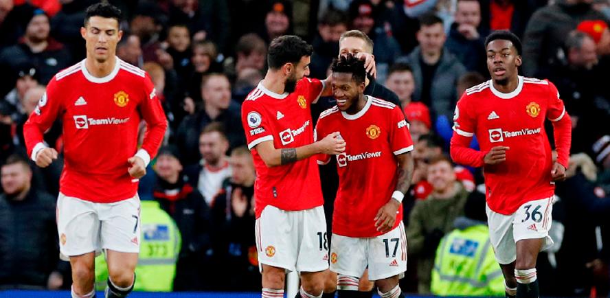 Manchester United’s Fred (2nd right) celebrates scoring their first goal with Bruno Fernandes (2nd left) during their English Premier League match against Crystal Palace at Old Trafford. – REUTERSPIX