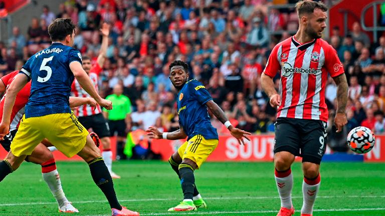 Manchester United’s Fred (centre) turns to see the ball after he deflected Southampton’s Che Adams (left) shot resulting in the opening goal. – AFPPIX