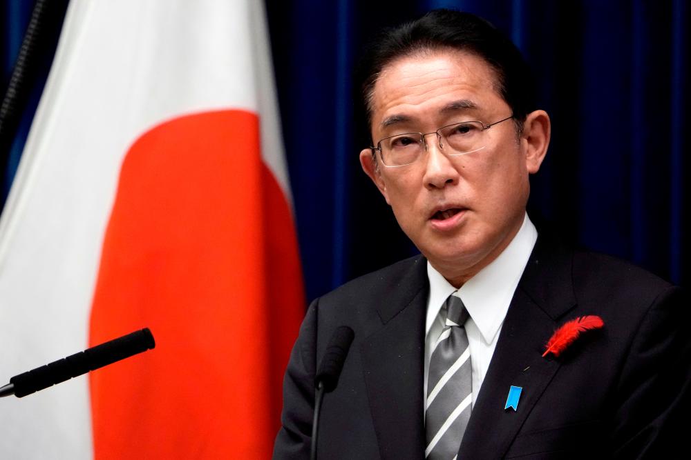 FILE PHOTO: Japanese Prime Minister Fumio Kishida speaks during a news conference at the prime minister's official residence in Tokyo, Japan October 14, 2021. Eugene Hoshiko/Pool via REUTERSpix