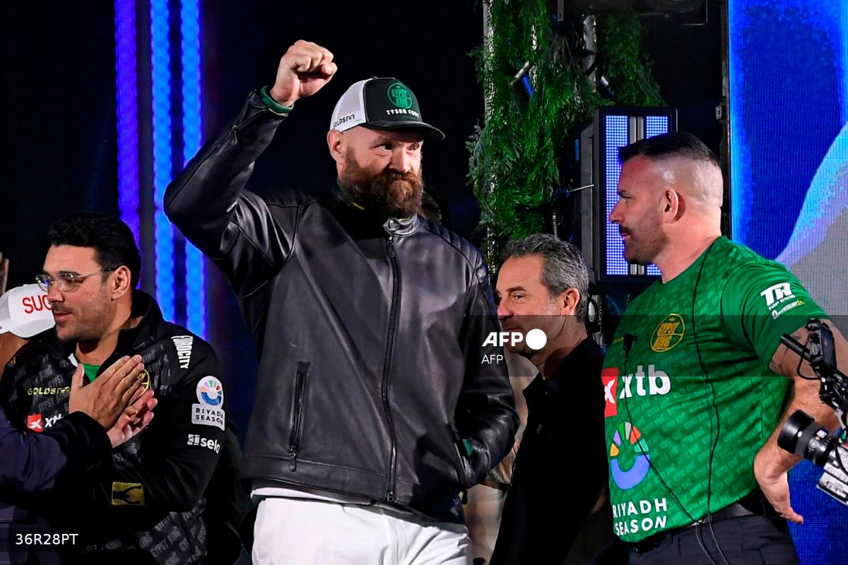Britain's Tyson Fury (C) gestures on stage during the official weigh-in on the eve of his undisputed heavyweight world championship rematch against Ukraine's Oleksandr Usyk in Riyadh on December 20, 2024. - AFPpix