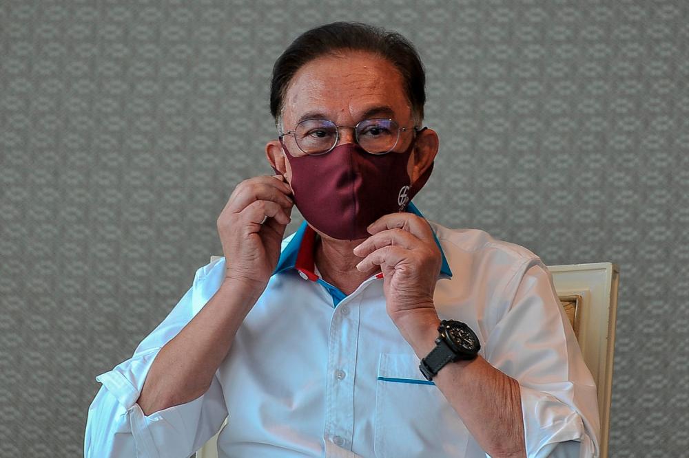 Anwar asks all MPs to plead with the King to revoke emergency