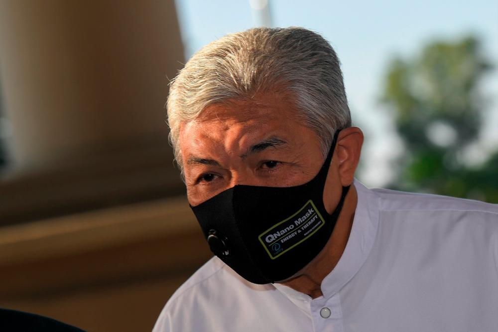 Former Deputy Prime Minister Datuk Seri Dr Ahmad Zahid Hamidi, who is facing corruption, abuse of power and money laundering charges involving millions of ringgit in Yayasan Akalbudi funds, arrives at the High Court on March 5.- Bernama