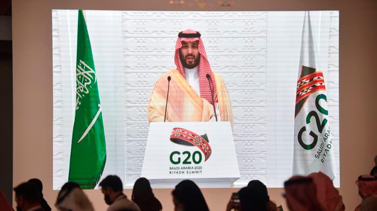 Saudi and foreign media representatives listen to Saudi Crown Prince Mohammed bin Salman remotely addressing a press conference, at the G20 summit’s Media Center in the capital Riyadh, on November 22, 2020. — AFP