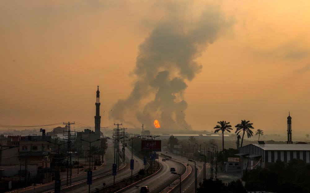 Fire erupts following an Israeli airstrike south of Gaza City on June 18, 2022. AFPpix