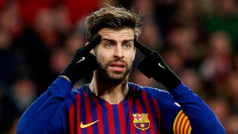 Barca's Pique investigated for remarks on referees favouring Real Madrid