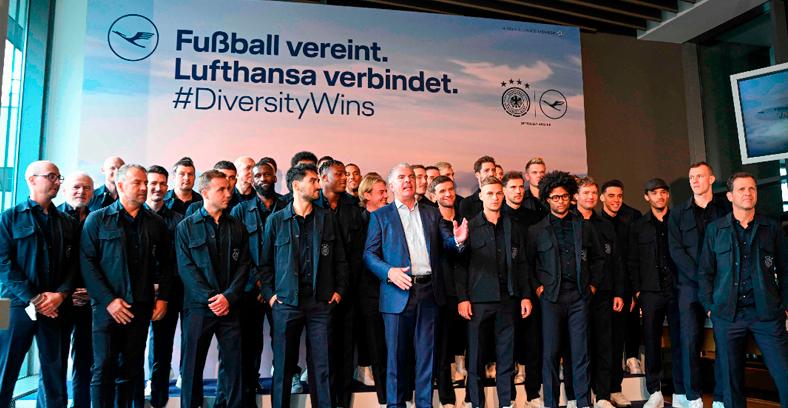 Carsten Spohr (centre), CEO of German airline Lufthansa, poses at the Lufthansa First Class Terminal with members of the German national football team prior to the team’s departure from the airport in Frankfurt am Main on Nov 14, 2022. – AFPPIX
