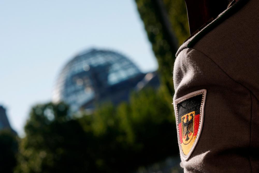 A German Army badge is seen on the shoulder of a soldier as Chancellor Olaf Scholz receives Chairman of the Ukrainian parliament (Verkhovna Rada) Ruslan Stefanchuk at the German Chancellery, in Berlin, Germany June 3, 2022. REUTERSpix