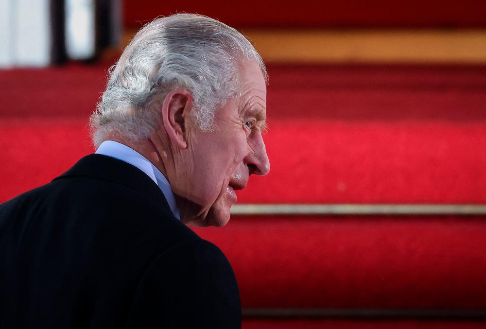 Britain’s King Charles III makes his way up the stairs as he arrive for a state banquet at the presidential Bellevue Palace in Berlin, on March 29, 2023. AFPPIX