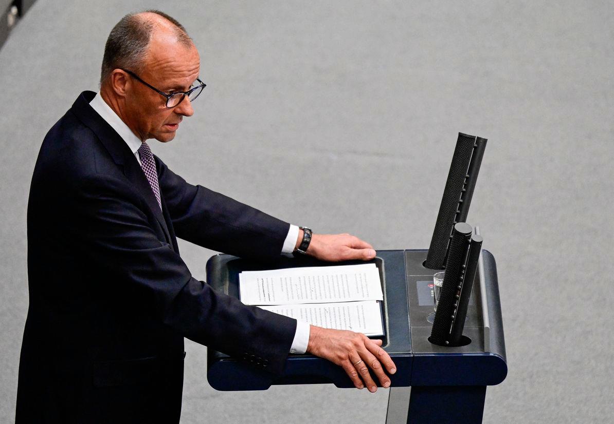German Chancellor Friedrich Merz addresses delegates at the Bundestag (lower house of parliament) on June 24, 2025 in Berlin, prior on the upcoming NATO and EU summits. (Photo by John MACDOUGALL / AFP)