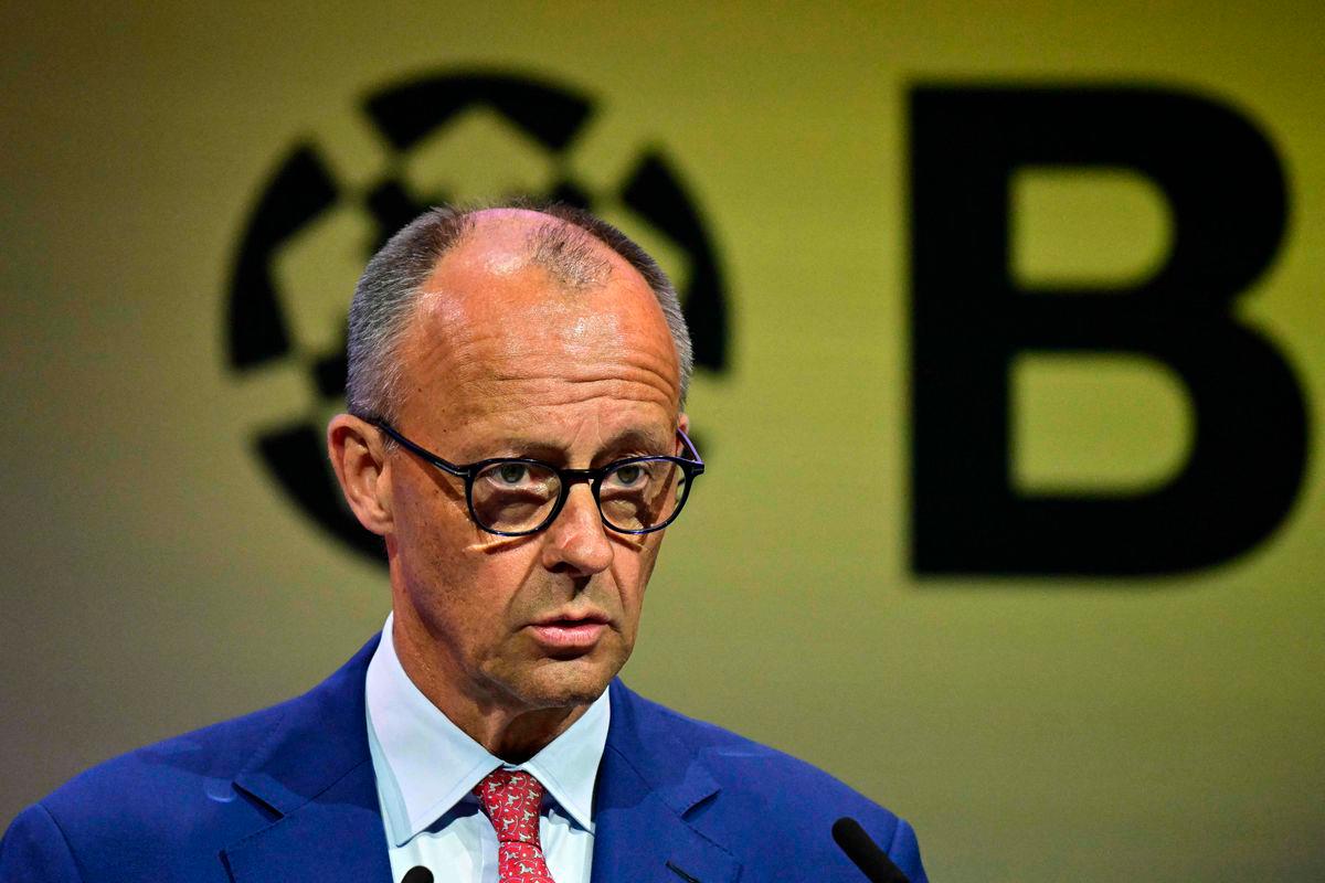 German Chancellor Friedrich Merz delivers his speech during the “Day of German Industry” conference for economic policy organized by the Federation of German Industries (BDI) in Berlin on June 23, 2025. (Photo by Tobias SCHWARZ / AFP)