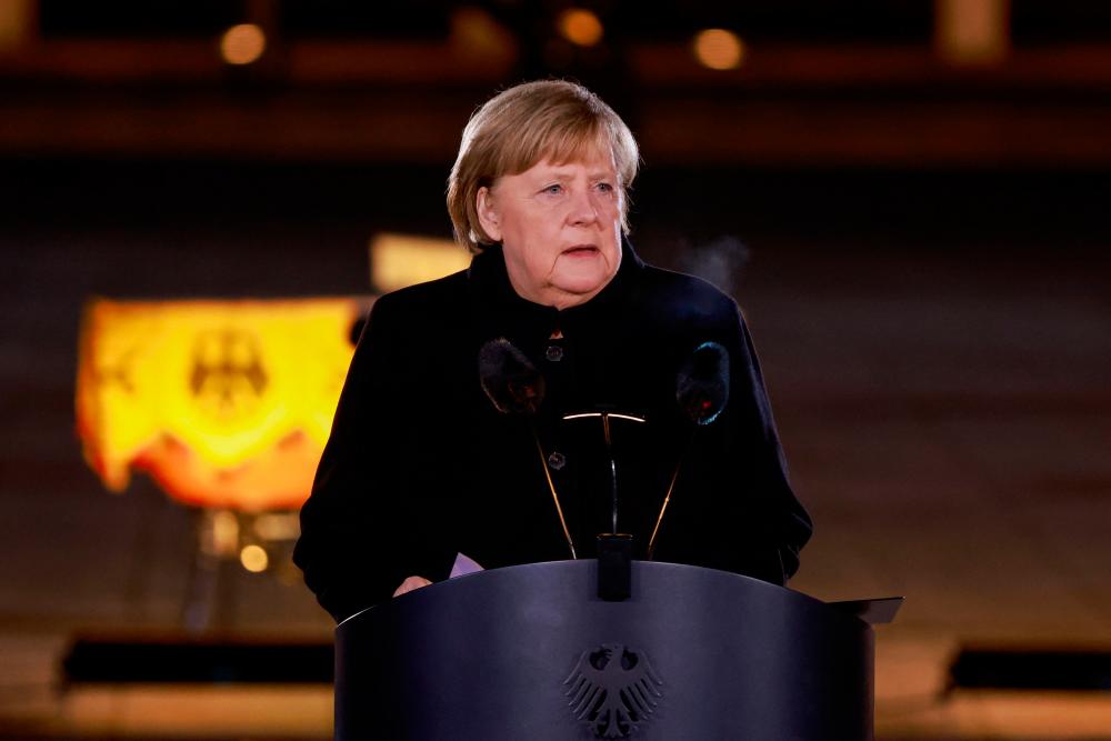 German Chancellor Angela Merkel makes a speech at the Defence Ministry during the Grand Tattoo (Grosser Zapfenstreich), a ceremonial send-off for her in Berlin on December 2, 2021. AFPpix