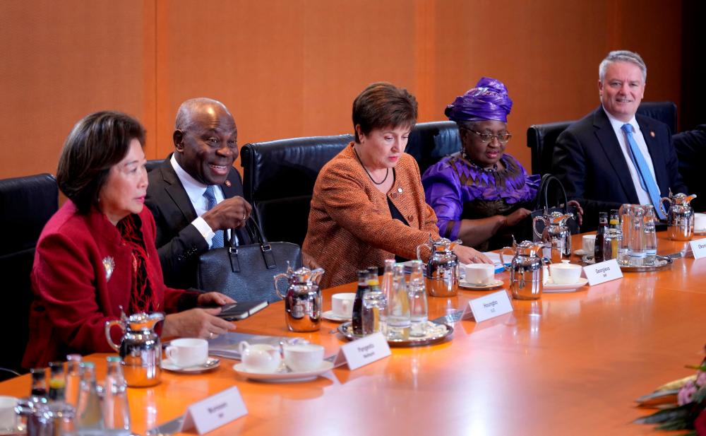 From left: World Bank managing director of development policy and partnerships Mari Elka Pangestu, International Labour Organization director-general Gilbert Houngbo, Georgieva, Okonjo-Iweala and Organisation for Economic Co-operation and Development secretary-general Mathias Cormann at a meetinbg with Scholz at the chancellery in Berlin on Tuesday. – Reuterspic