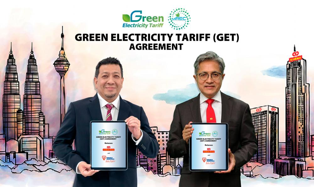 Sulaiman (right) and Megat Jalaluddin announcing the Green Electricity Tariff agreement between both parties to help AmBank Group achieves its sustainability framework agenda.