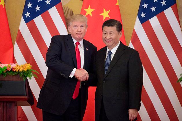 Donald Trump and Xi Jinping. Photo: Nicolas Asfouri/AFP/Getty Images