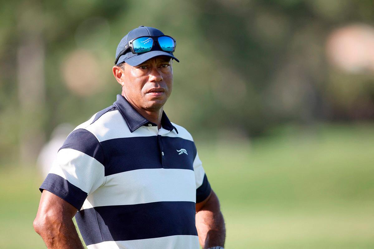 Tiger Woods watches his son Charlie Woods play during the first round of the U.S. Junior Amateur at Brook Hollow Golf Club on July 21, 2025 in Dallas, Texas. - Tim Heitman/Getty Images/AFP