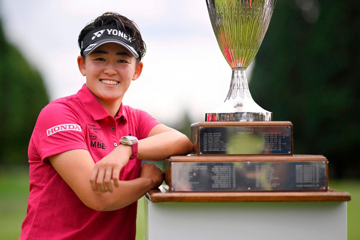 Akie Iwai of Japan poses with the trophy after winning The Standard Portland Classic 2025 at Columbia Edgewater Country Club on August 17, 2025 in Portland, Oregon. - Orlando Ramirez/Getty Images/AFP