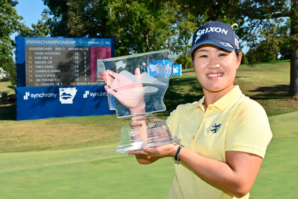 Hataoka poses with the trophy after winning the Walmart NW Arkansas Championship at Pinnacle Country Club in Rogers, Arkansas. – AFPPIX