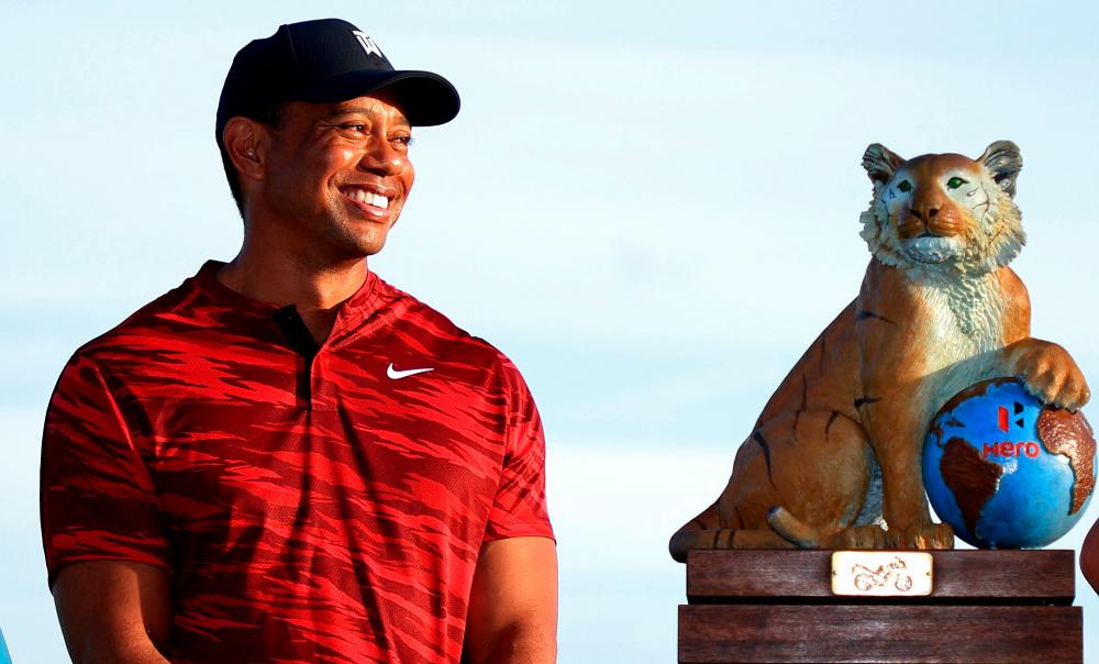 NASSAU, BAHAMAS - DECEMBER 05: Tiger Woods of the United States looks on during the trophy ceremony after the final round of the Hero World Challenge at Albany Golf Course on December 05, 2021 in Nassau, . AFPpix