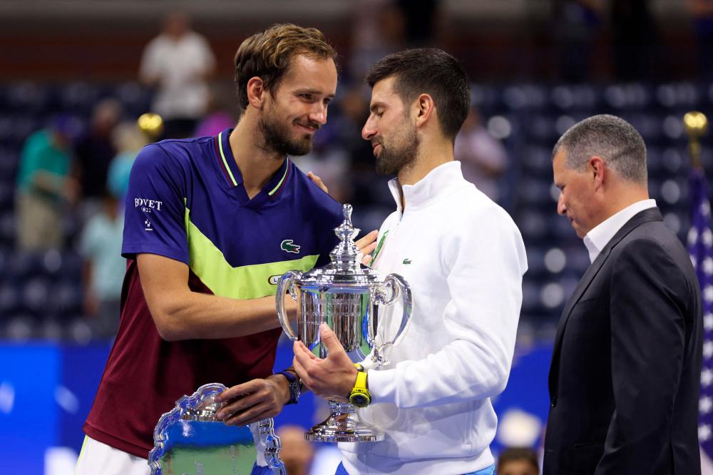 Champion Novak Djokovic of Serbia is congratulated by finalist Daniil Medvedev of Russia following their Men’s Singles Final match on Day Fourteen of the 2023 US Open. AFPPIX