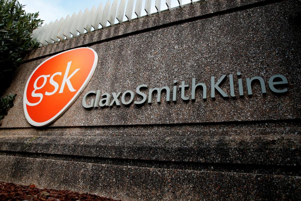 Company logo of pharmaceutical company GlaxoSmithKline is seen at their Stevenage facility, Britain October 26, 2020. — Reuters