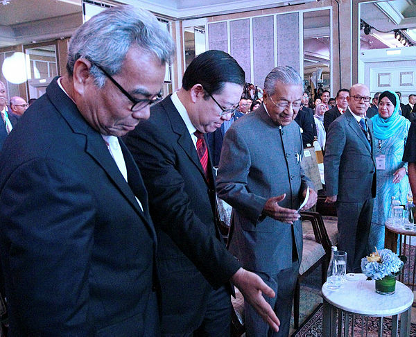 From left: Minister of Entrepreneur Development, Datuk Seri Mohd Redzuan Md Yusof, Finance Misniter Lim Guan Eng and Prime Minister Tun Dr Mahathir Mohamad, at the Invest Malaysia 2019, on March 19, 2019. — Sunpix by Zulkifli Ersal