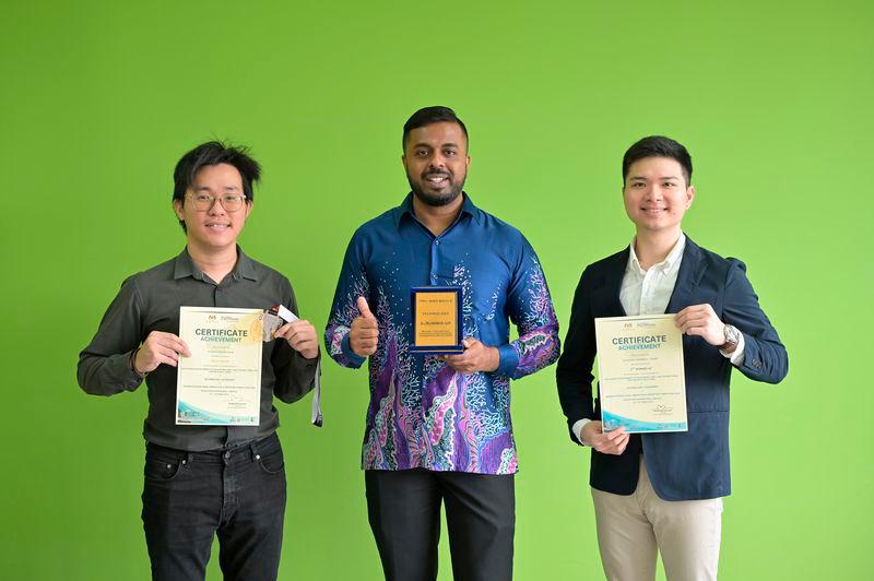 Gunalaan, alongside his team members Ng Wi Liam (left) and Cheng Zhi Qin (right) from the Bachelor of Construction Management and Economics (Hons) programme at TAR UMT, proudly displaying the Second Runner-Up and Gold Award certificates, plaque, and medal from BIIIC 2024.