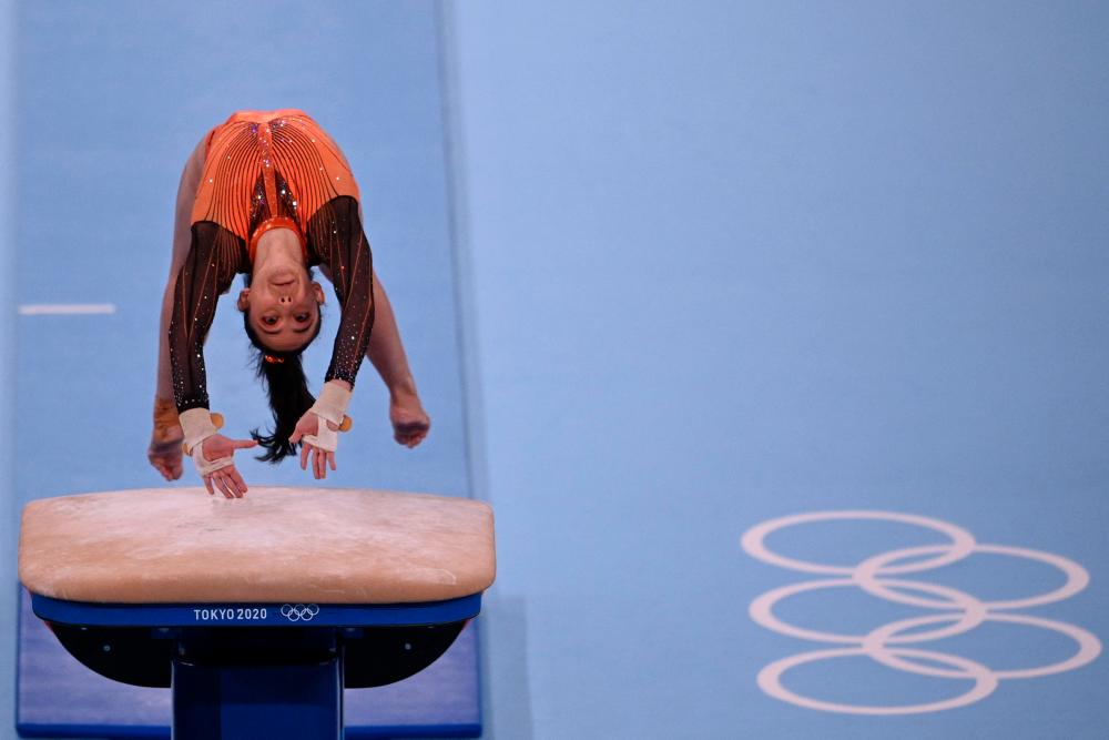 Malaysia’s Farah Ann Abdul Hadi competes in the artistic gymnastics vault event of the women’s qualification during the Tokyo 2020 Olympic Games at the Ariake Gymnastics Centre in Tokyo on July 25, 2021. AFPpix