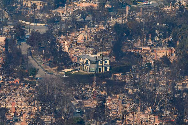 An aerial view shows debris from burned properties, following the Palisades Fire at the Pacific Palisades neighborhood in Los Angeles - REUTERSpix