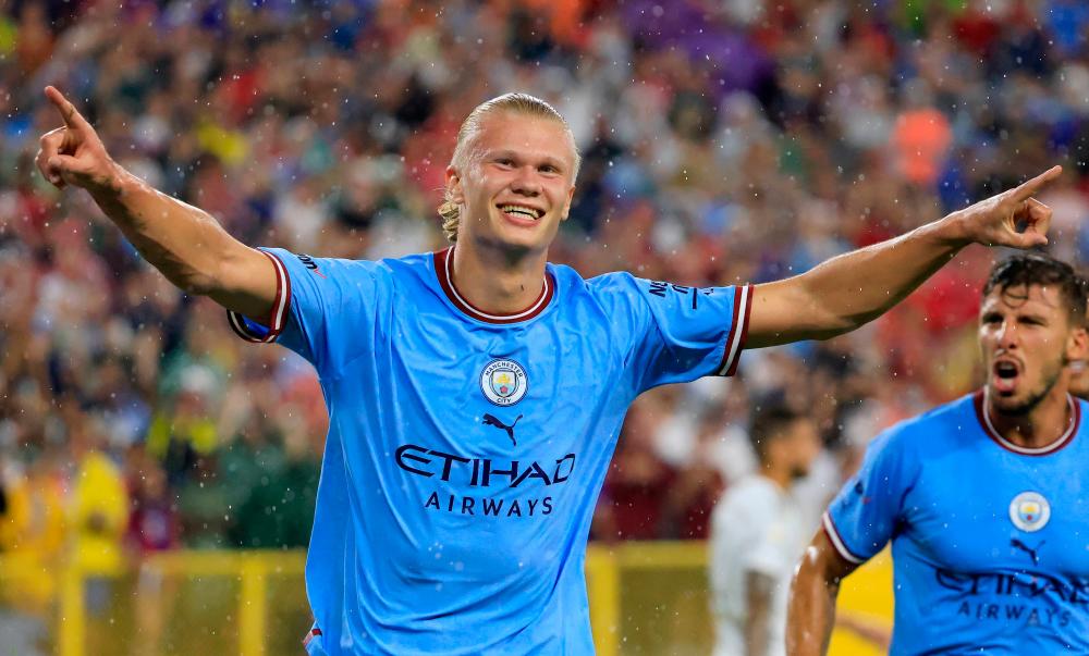 Erling Haaland of Manchester City celebrates after scoring their team's first goal during the pre-season friendly match between Bayern Munich and Manchester City at Lambeau Field. AFPpix