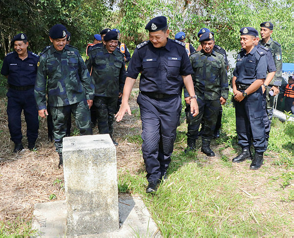 Inspector-General of Police Datuk Seri Abdul Hamid Bador (front) during a visit to the Kelantan side of the Malaysia-Thailand border, on May 22, 2019. — Bernama
