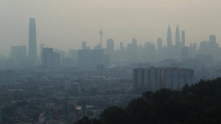 A view of the Kuala Lumpur skyline shrouded by haze on Aug 1, 2019. — BBX