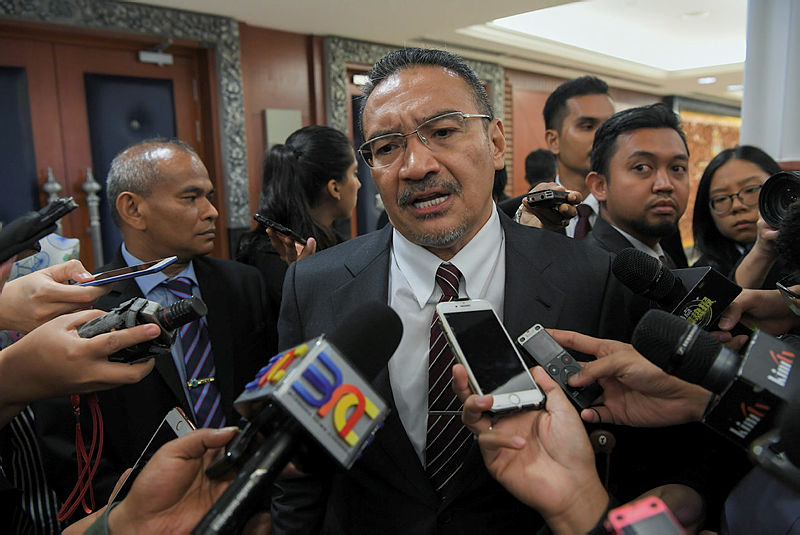 Datuk Seri Hishammuddin Hussein speaks to reporters at the Parliament lobby, on March 18, 2019. — Bernama