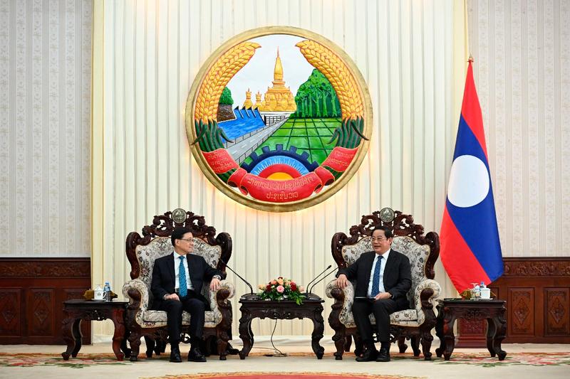 Hong Kong’s Chief Executive John Lee (left) meets Laos Prime Minister Sonexay Siphandone.