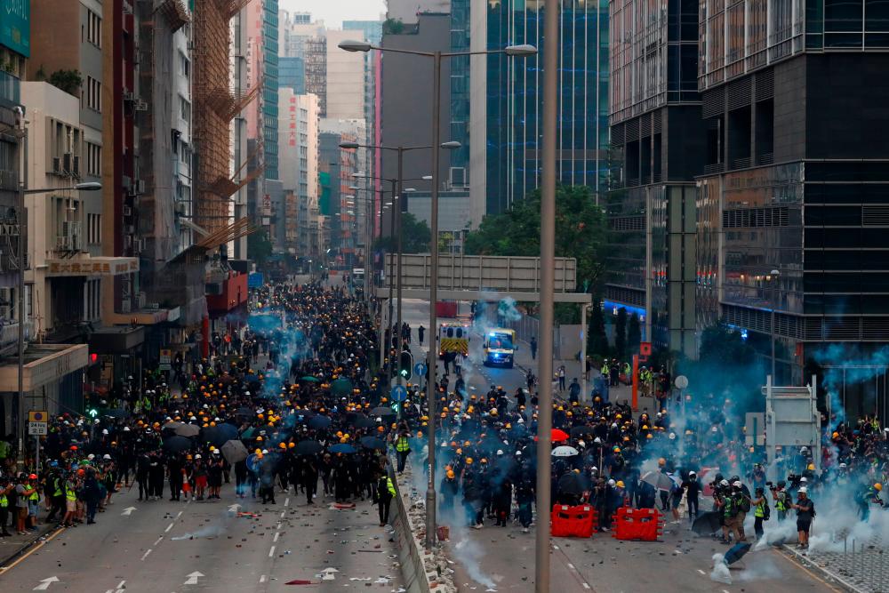 Protesters clash with police in Ngau Tau Kok in Hong Kong, China, Aug 24, 2019. — Reuters