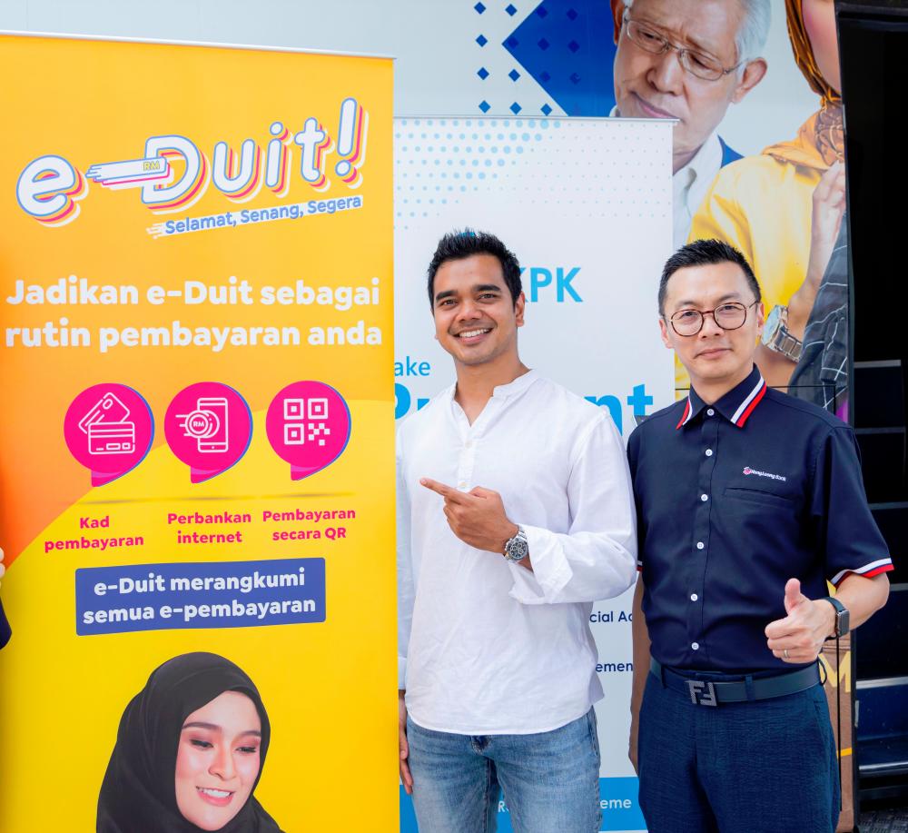 Alif Satar at the launch event with Andrew Jong