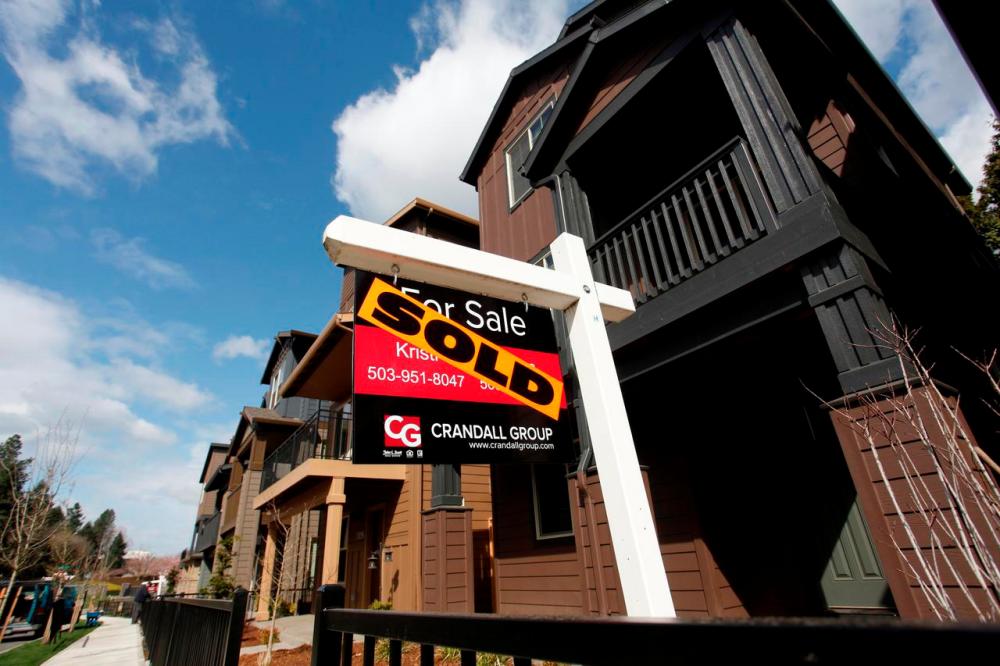 US existing home sales near 14-year high in August, prices race to record peak