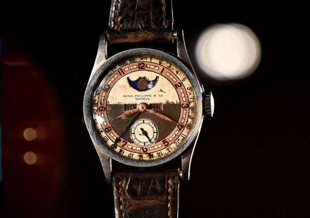 The Patek Philippe Ref 96 Quantieme Lune timepiece once owned by Aisin-Gioro Puyi, the Chinese Qing dynasty’s last emperor, is seen on display in Hong Kong on May 23, 2023 ahead of its auction in the territory on the same day. AFPPIX