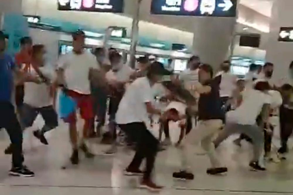 This frame grab taken from video recorded on July 21, 2019 and released by Hong Kong lawmaker Lam Cheuk Ting shows a mob of men in white T-shirts clashing with pro-democracy protesters on the platform of Yuen Long station in Hong Kong. — AFP