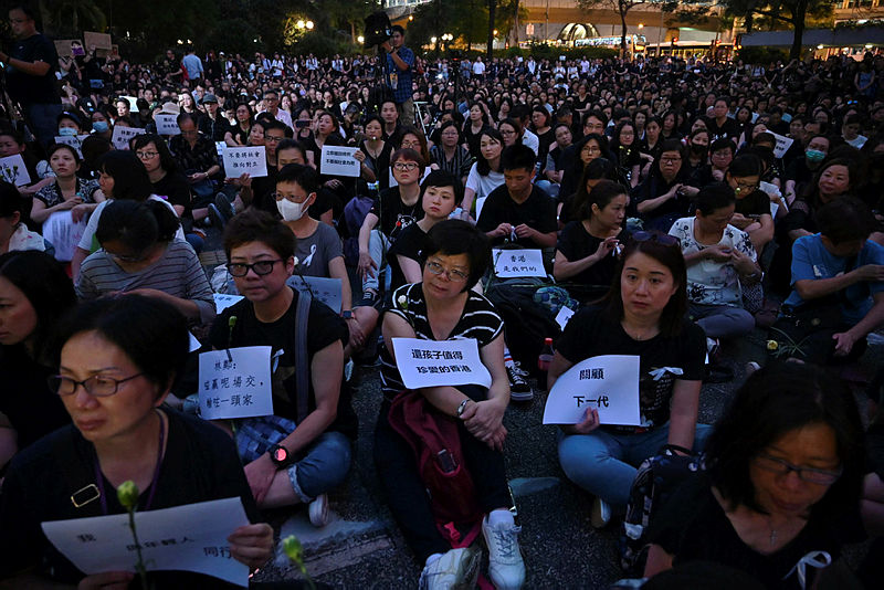 Protesters attend the ‘Hong Kong Mothers Anti-Extradition Rally’, in protest against actions of the city’s police force in recent demonstrations against a proposed extradition bill, in Hong Kong on June 14, 2019. Hong Kong’s embattled leader faced mounting pressure on June 14 to abandon a deeply unpopular plan to allow extraditions to China, with protest organisers getting police go-ahead to hold a new rally at the weekend. — AFP