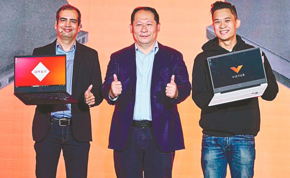 From left: HP Inc Malaysia &amp; Singapore PC business director Yogesh Bhatia, Tan and HP Malaysia PC consumer category manager Poh Chi Meng at the launch of HP Omen 16 and Victus by HP 16 gaming laptops in Malaysia.