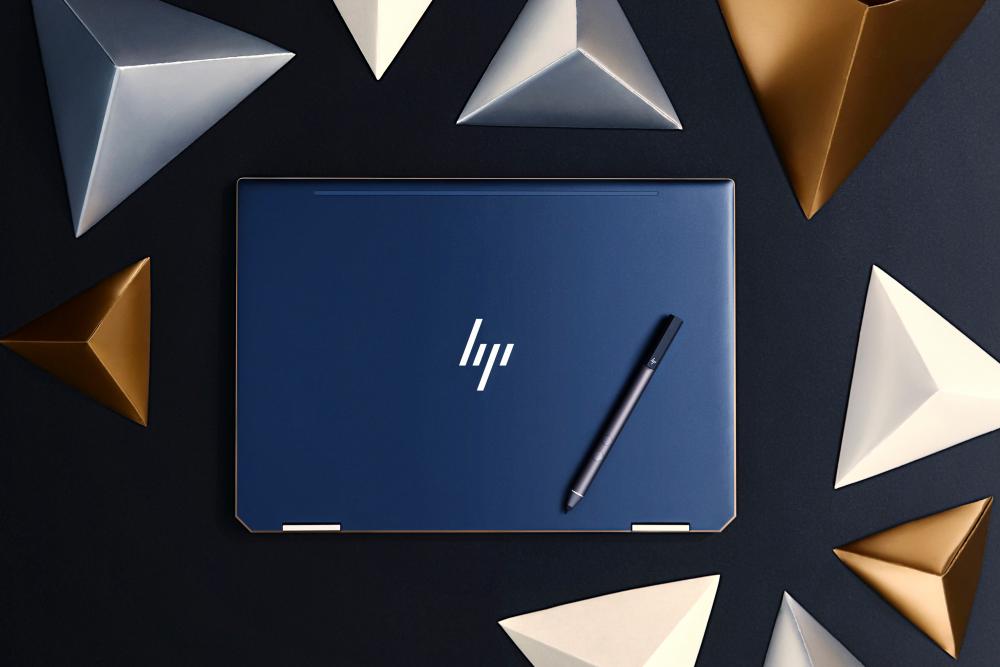 The redesigned HP Spectre x360 13, is available in the all-new Poseidon Blue.