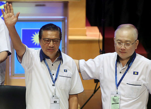 Former MCA president Datuk Seri Liow Tiong Lai waves to the delegates after delivering his speech at the 65th MCA annual general assembly at Wisma MCA on Dec 2, 2018. — BBXpress